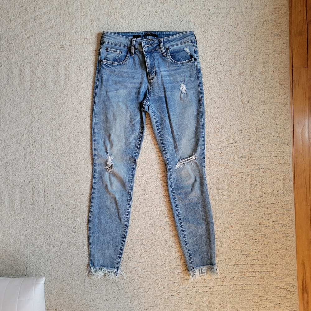 Distressed Light Blue Jeans